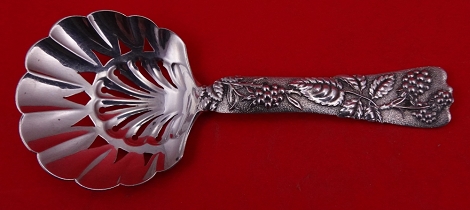 Bon Bon Spoon pierced w/ raspberry motif  5 3/8